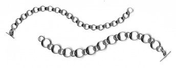 ROUND $240 each-sterling silver bracelet with sanding disk texture on tubes (7 1/2" long) ROUND $240 each-sterling silver bracelet with sanding disk texture on tubes (7 1/2" long)